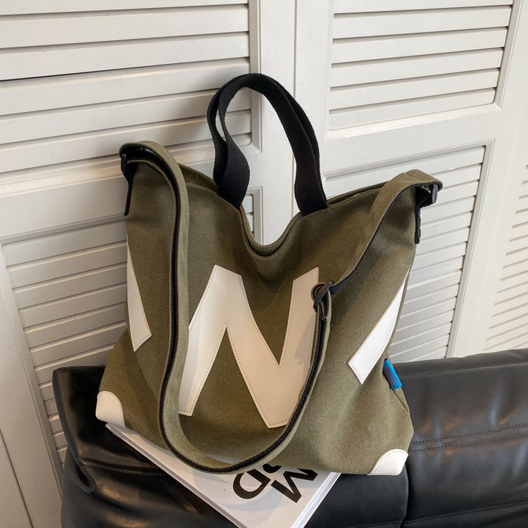 2024 New Canvas Bag Women's Ins Style Japanese Student Bag Simple Literary Messenger Bag Shoulder Women's Bag Tote