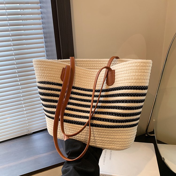 Woven straw bag women's large capacity 2024 new summer versatile shoulder bag texture commuter seaside beach bag