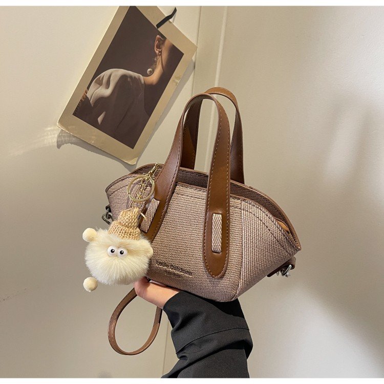 Retro Korean Contrast Color Hand Bucket Bag Women's 2024 Autumn New Textured Fashion Messenger Bag Popular Shoulder Bag