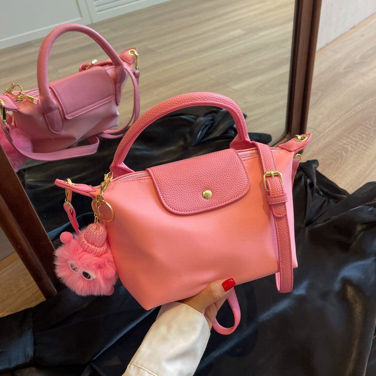 Mini French dumpling cosmetic bag, high-grade dragon fragrance nylon with leather, no punching shoulder strap, portable cross-body ready-made manufacturer