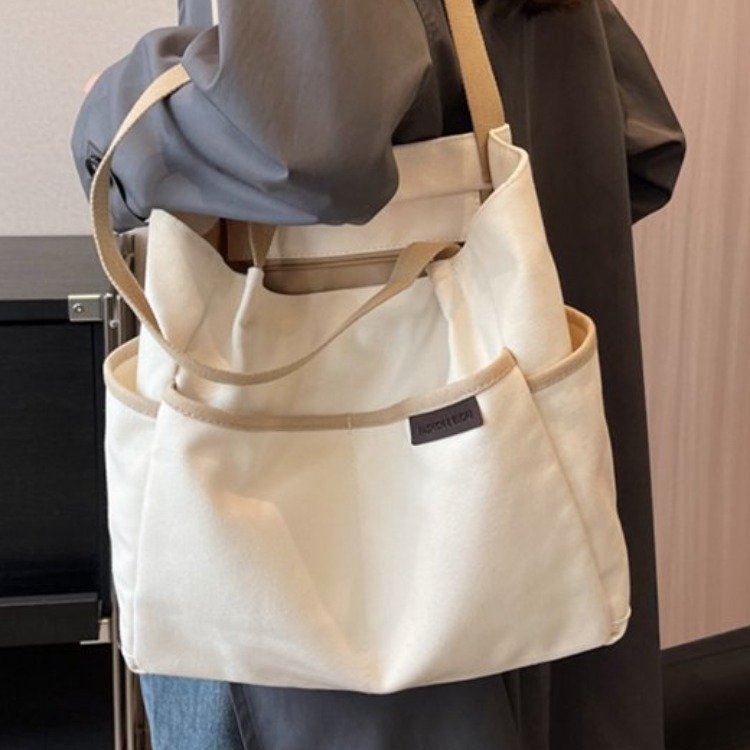 2024 new original large-capacity solid color shoulder bag for college students to go to class and commute with high-looking portable tutoring bag
