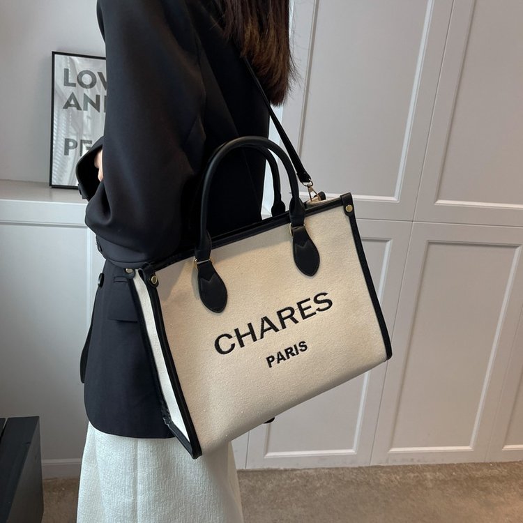 Fashionable and versatile women's bag, simple large-capacity tote bag, niche design, high-end commuter bag, canvas shoulder crossbody bag