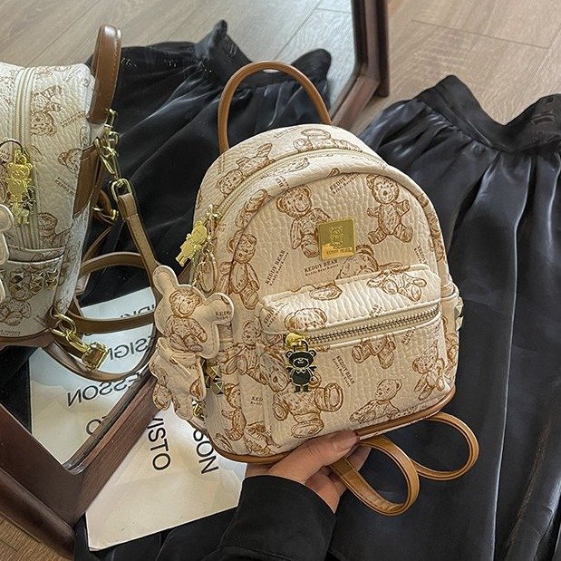 Foreign trade casual women's bag, high-end printed backpack, niche design, rivet printed bear PU soft leather bag for women
