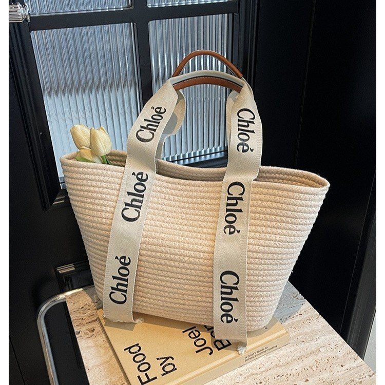 Niche design holiday style straw woven tote bag new summer large capacity casual woven portable summer women