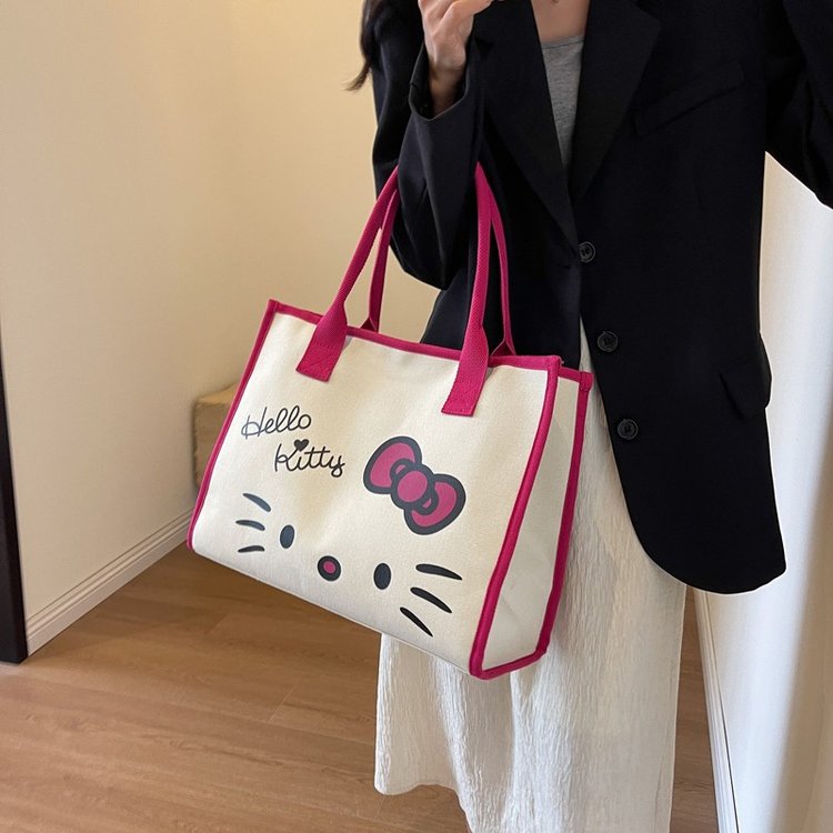 Cute Hello Kitty canvas bag Large-capacity commuter shoulder bag Fashion tote bag College student class tote bag