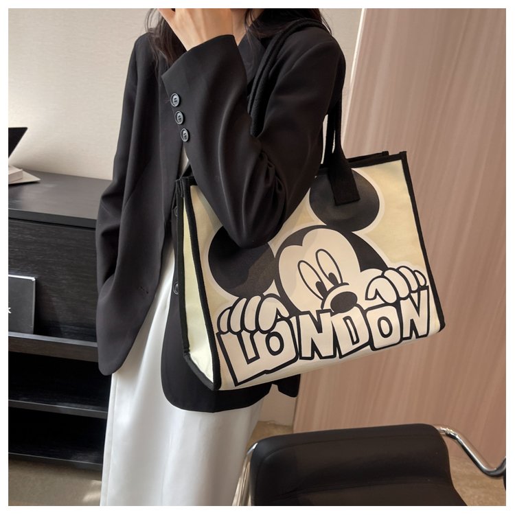 Wholesale Cartoon Mickey Canvas Bag Women's New Versatile Shoulder Bag Commuting Tote Bag Large Capacity Portable Mummy Bag