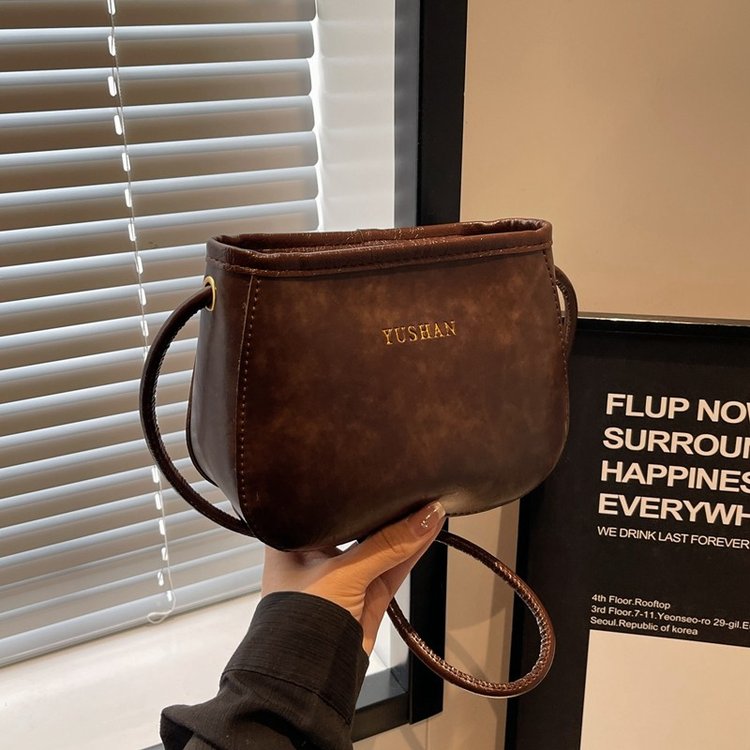Women's bag new crossbody bag solid color bucket bag retro versatile niche design high-end casual shoulder bag