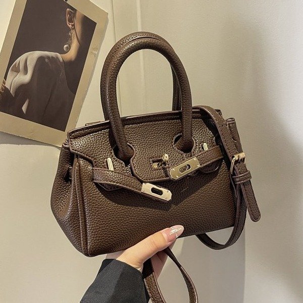 High-end pebbled hand-held platinum small square bag for women 2024 new versatile commuter shoulder crossbody Kelly bag