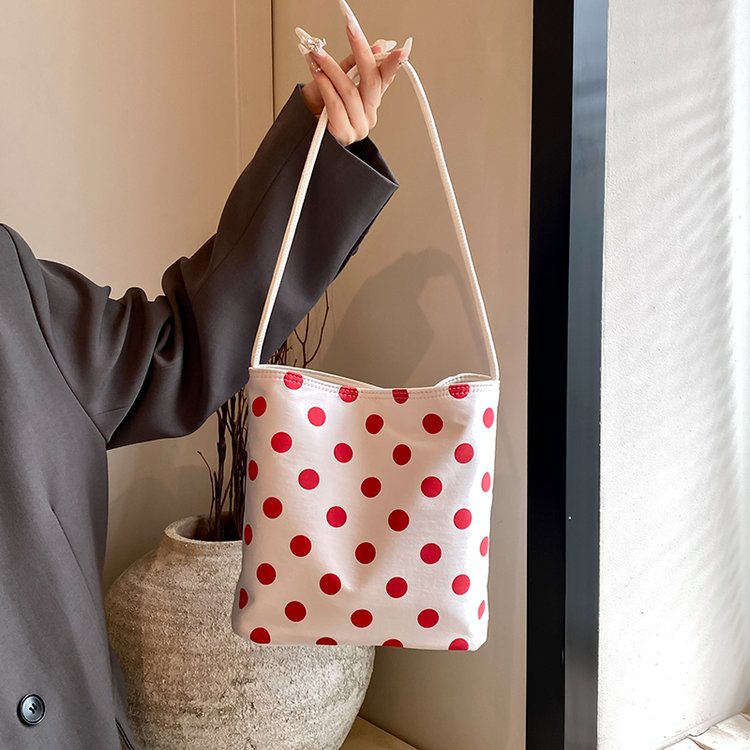 This year's popular super popular niche polka dot bag women's 2024 new versatile shoulder armpit bag small tote bag bucket bag