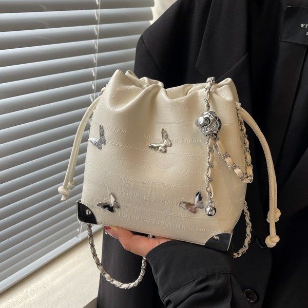 High-end metal bow bucket bag for women 2024 summer new style niche drawstring bag fashionable women's bag
