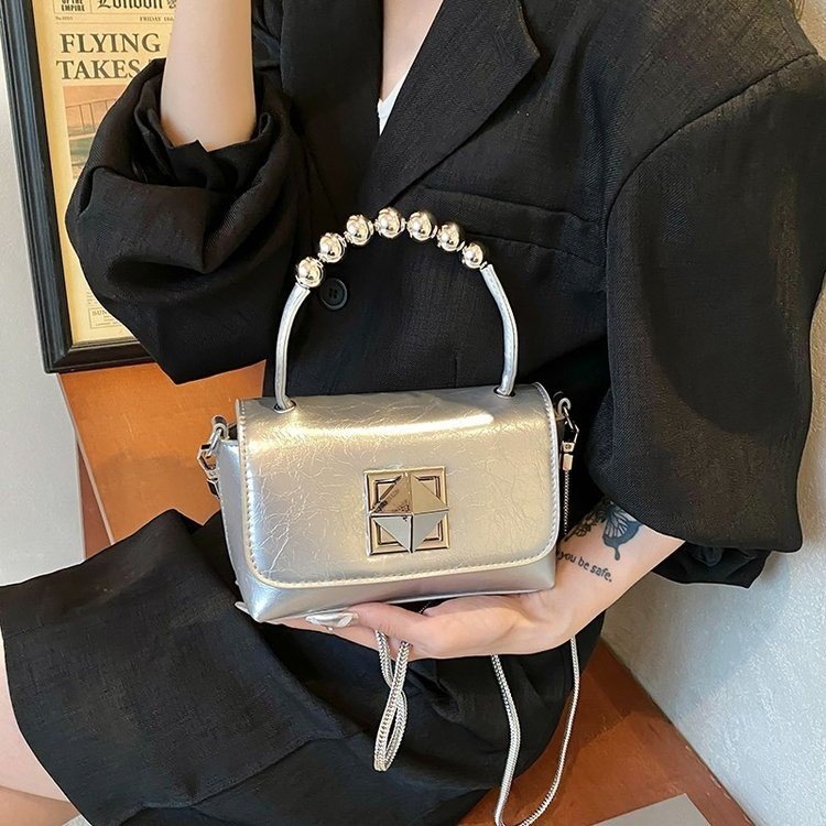 Design texture beaded handheld small bag women's 2024 summer new niche design mini chain shoulder crossbody bag
