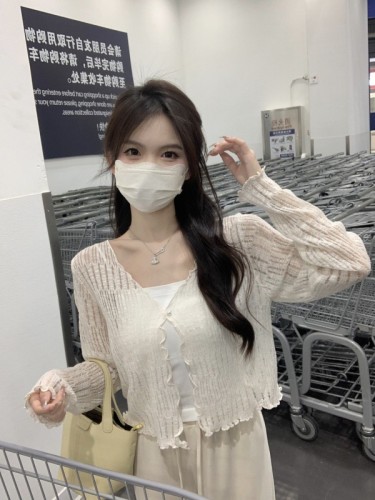 Spring and summer Korean style sweet fungus edge hollow sunscreen long-sleeved knitted one-button cardigan top for women