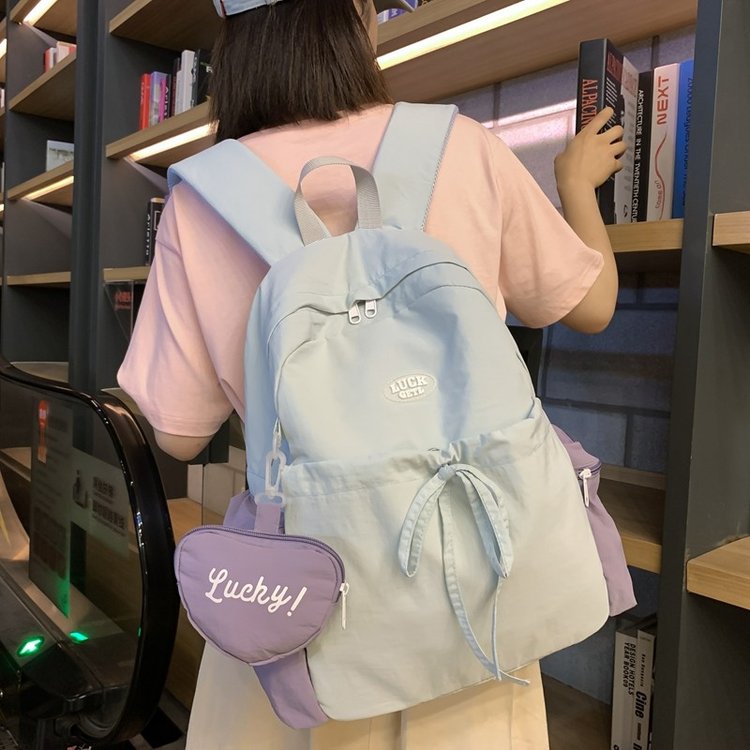 Junior high school student schoolbag female Korean version versatile solid color college student backpack lightweight large capacity high school student travel backpack