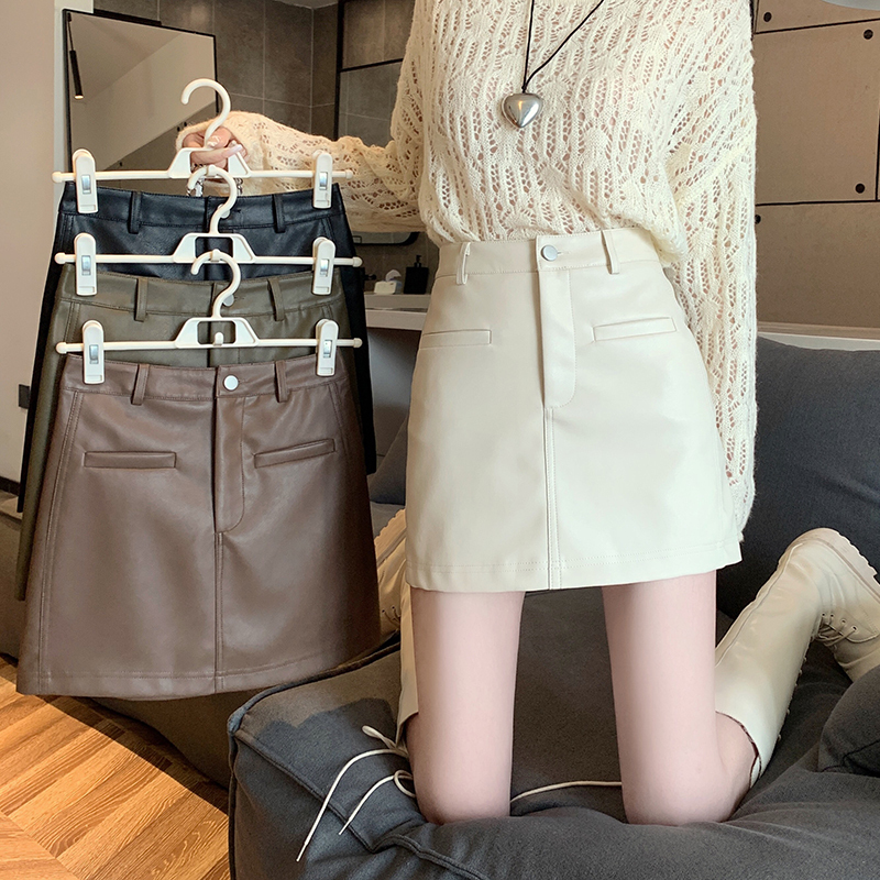 Autumn new Korean style high-waist slim versatile hip-hugging short skirt niche solid color design PU skirt for women