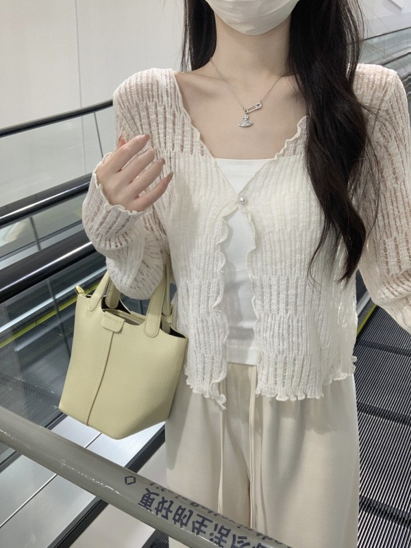 Spring and summer Korean style sweet fungus edge hollow sunscreen long-sleeved knitted one-button cardigan top for women