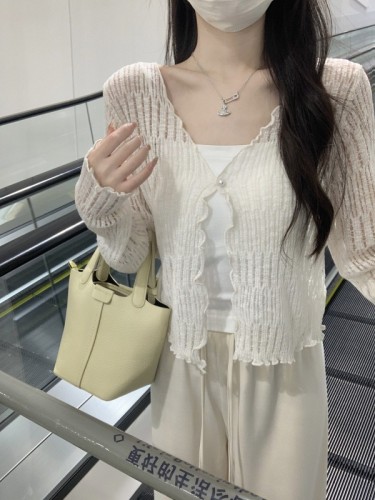 Spring and summer Korean style sweet fungus edge hollow sunscreen long-sleeved knitted one-button cardigan top for women