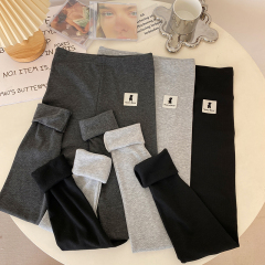 Autumn and winter large size threaded thickened brushed leggings solid color nine-point pants striped leggings warm pants for outer wear