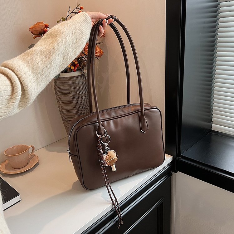 New PU leather commuter bag for women, high-end large-capacity shoulder bag for women, versatile simple niche style armpit bag