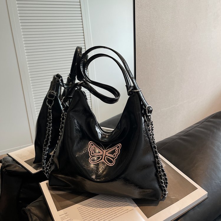 High-end fashionable burst pattern bow portable large-capacity bag for women new simple armpit tote bag