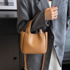 Women's bag Yuanbao bag mini vegetable basket series spring and summer genuine leather design hand-held crossbody mini bag for women