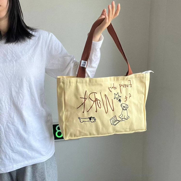 Puppy canvas tote bag for women 2024 new style French niche lightweight portable outing versatile commuting portable shoulder bag English