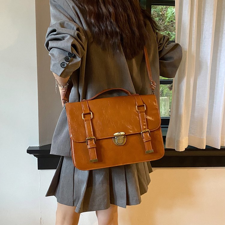 Student school bag backpack autumn and winter retro buckle messenger bag college style class bag fashion commuter briefcase cross-body