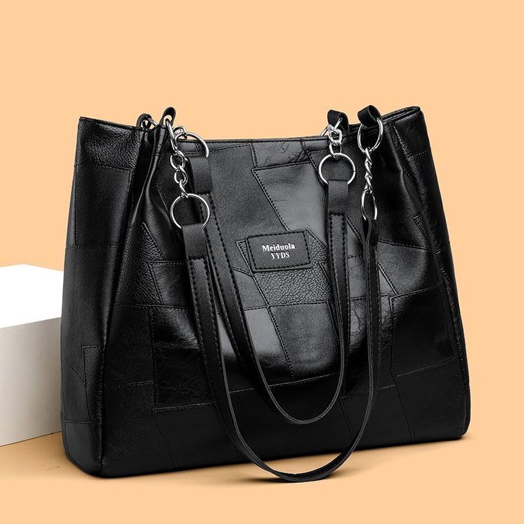 Large capacity bucket tassel tote bag 2024 new light luxury mother-in-law shoulder bag commuter handbag