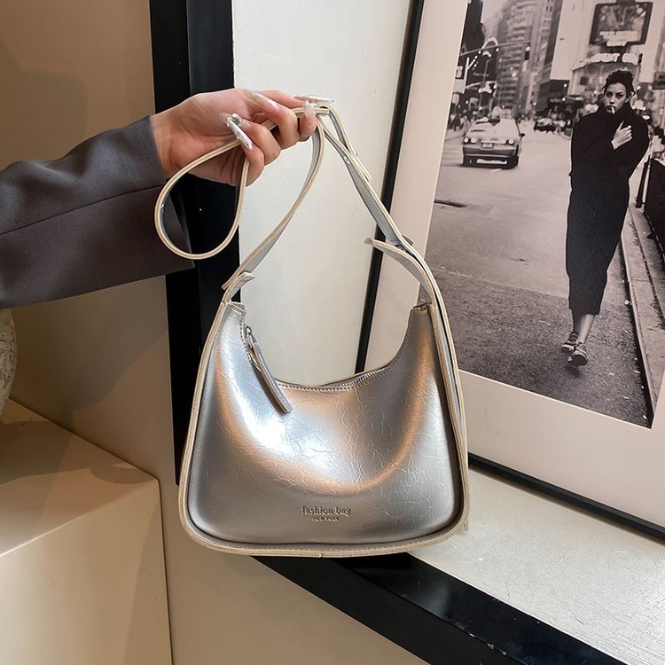 Niche design silver armpit bag fashion trend shoulder bag 2024 summer new women's bag high-end baguette bag