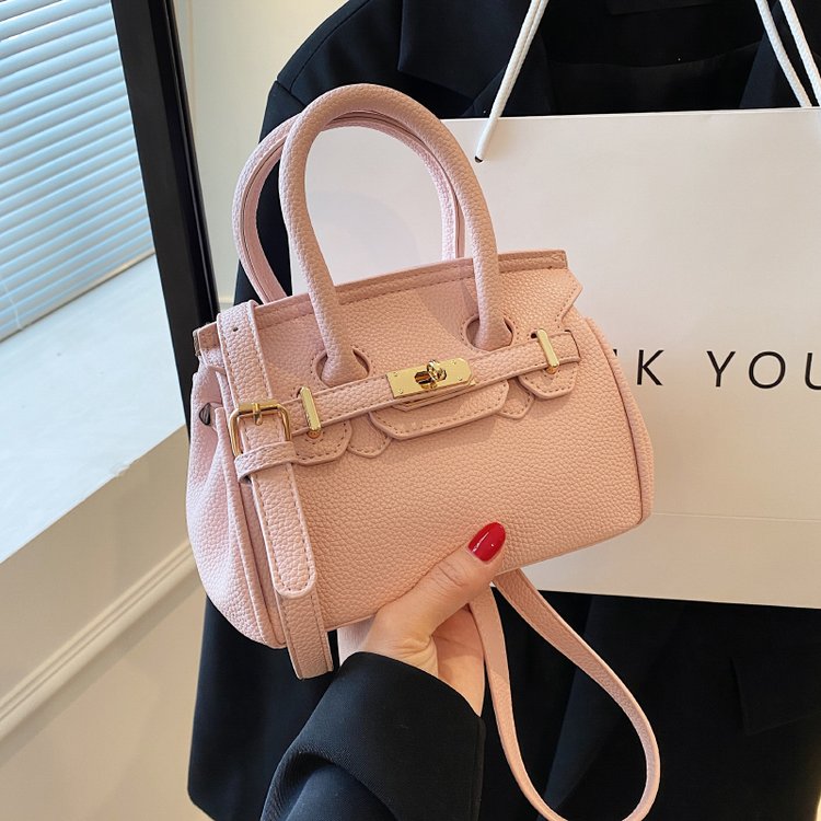 Hand-held commuting bag women's new niche high-end cherry blossom pink platinum bag niche versatile crossbody bag
