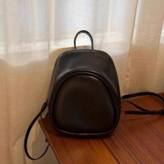 IOSONO Korean niche backpack ins large capacity casual backpack simple and versatile student commuter soft leather bag