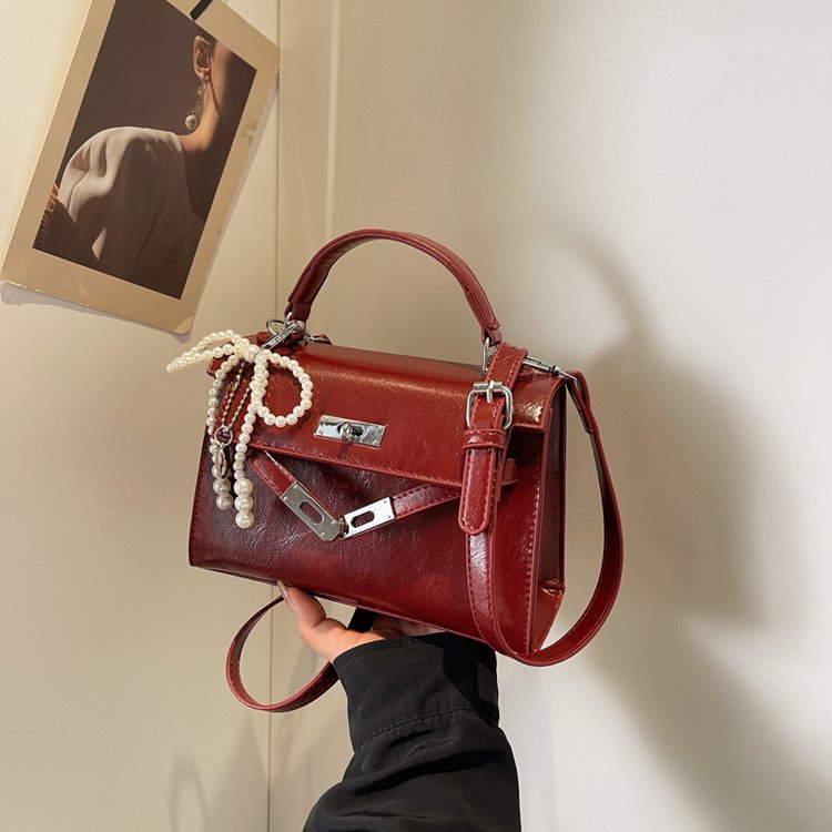 Wholesale fashion handheld red bag for women 2024 new Korean version Kelly bag versatile simple messenger bag small square bag
