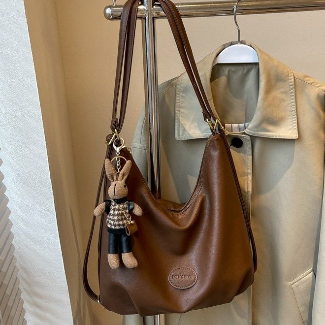 New Korean style large-capacity tote bag, women's bag, gentle forest backpack, single shoulder crossbody bag, commuter armpit bag