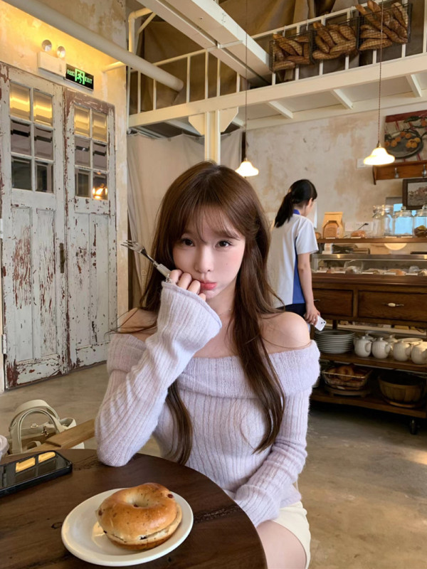 Actual shot of one-shoulder lapel smocked slightly see-through stacked collar top sweater