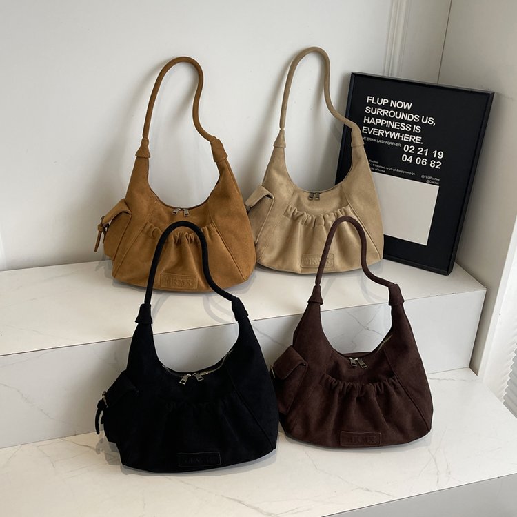 Niche high-end retro hottie armpit bag for women 2024 new style Maillard style shoulder bag pleated dumpling bag