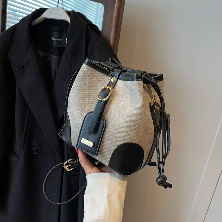 High-end canvas contrasting color cross-body bucket bag for women summer 2024 new trendy niche design versatile shoulder bag