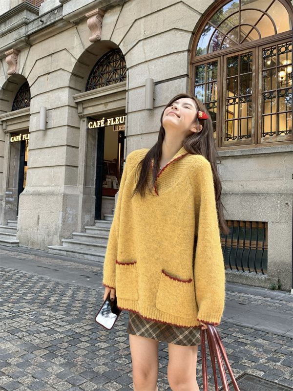 Sweet and soft contrasting color stand collar loose pullover sweater