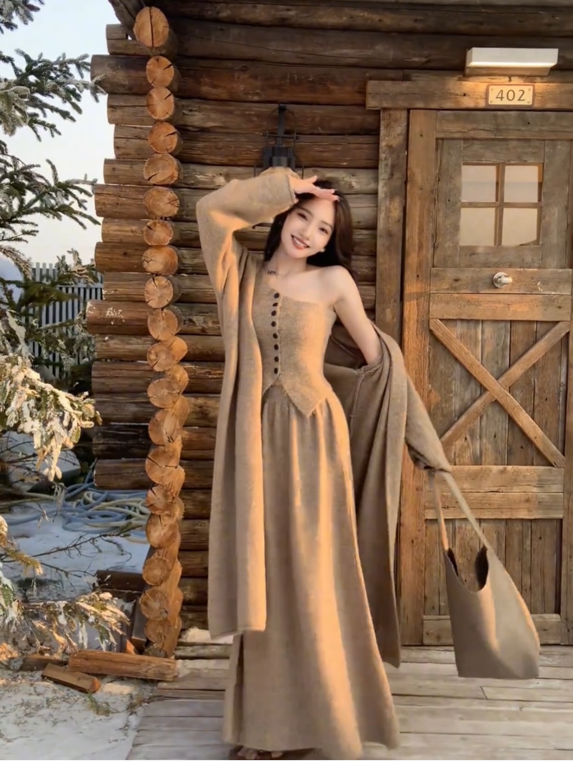 Autumn and winter high-end mid-length knitted cardigan jacket + off-shoulder breasted tube top + skirt three-piece set for women