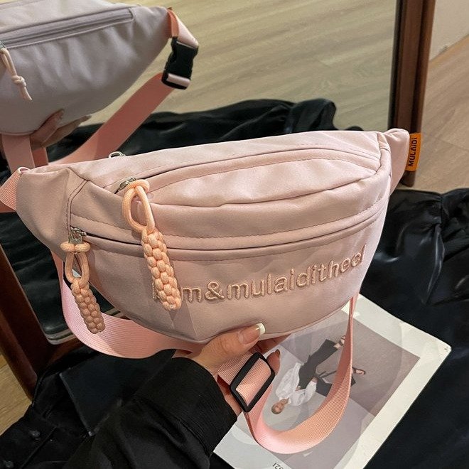 2024 letter dumpling temperament fashionable design one-shoulder cross-body solid color lock buckle fresh armpit texture student bag