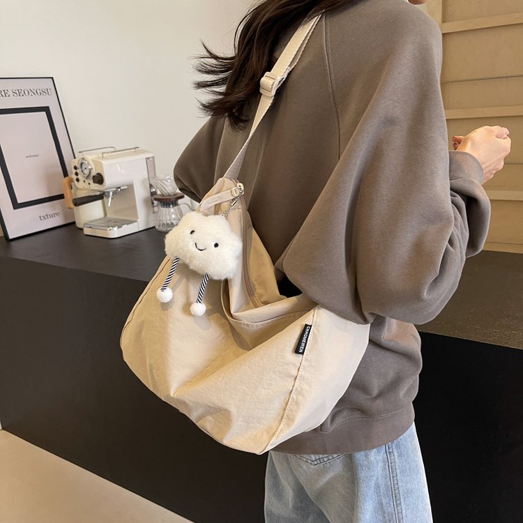 Solid color casual large-capacity crossbody bag for men and women, versatile, stylish and personalized college student bag, shoulder bag, tote bag