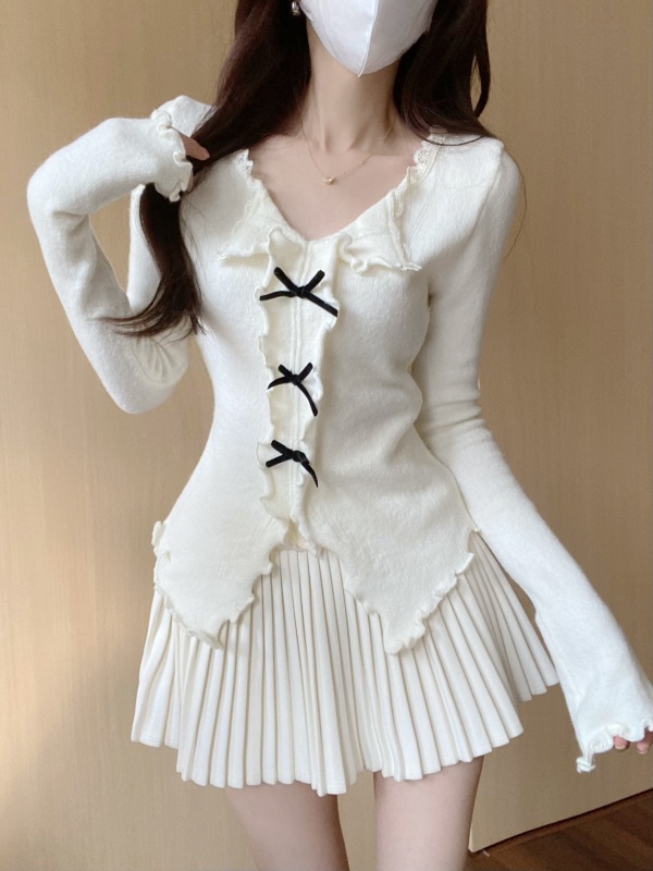Irregular blue fungus-edged V-neck bow knitted sweater with a unique and unique style