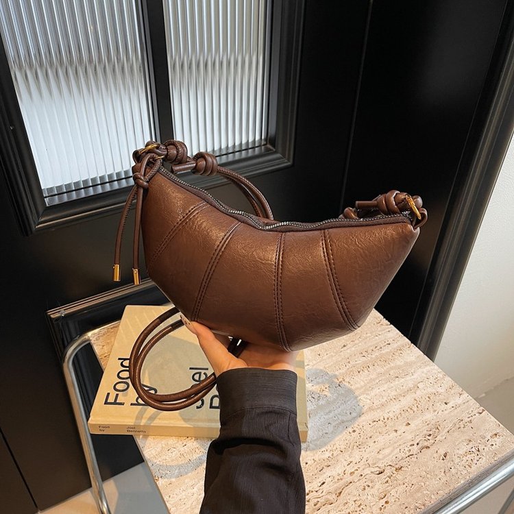 Korean niche croissant women's 2024 new casual simple cross-body dumpling bag daily commuting mobile phone bag