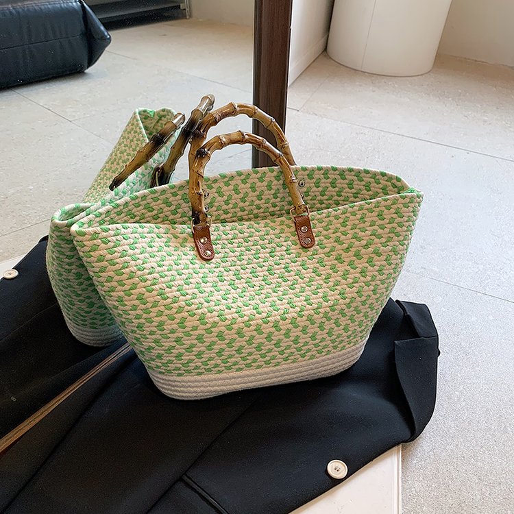 Large-capacity fashionable texture simple handbag women's 2024 spring new woven versatile ins bucket bag trend