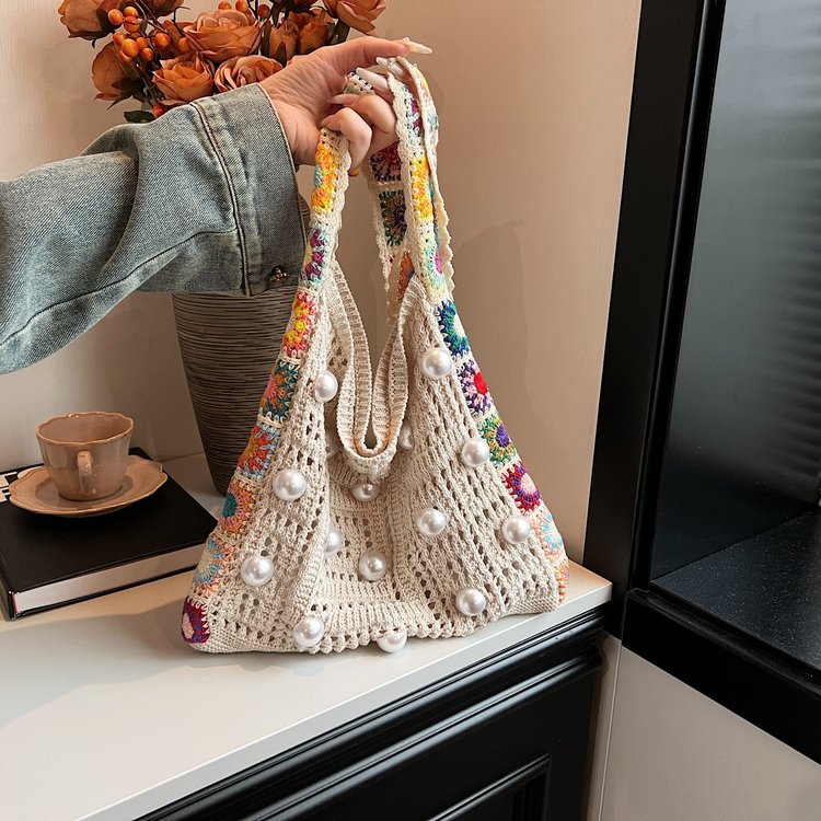Cross-border hollow woven bag women's 2024 new fashion popular summer pearl large capacity commuter shoulder tote bag