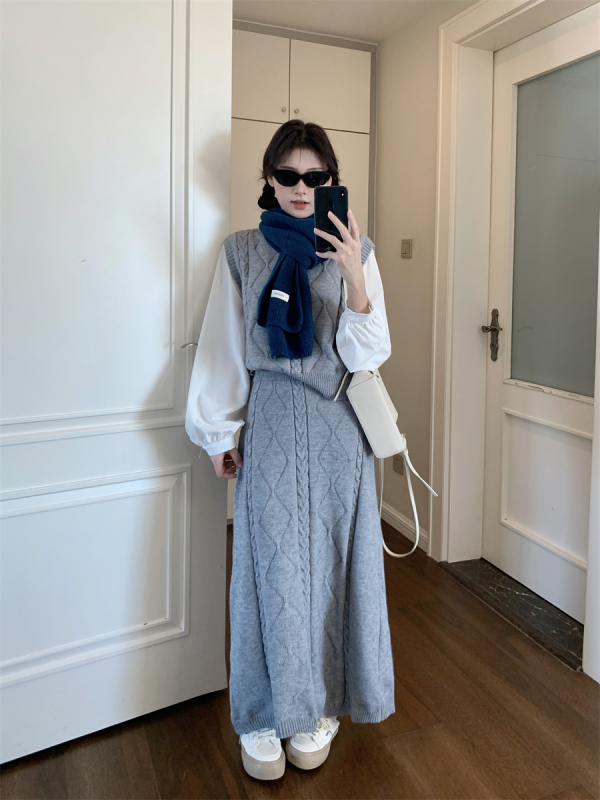 Autumn and winter French slim and versatile casual fake two-piece long-sleeved sweater knitted skirt suit