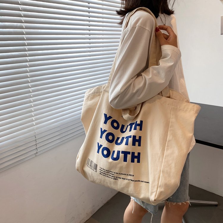 Canvas bag tote bag new Korean version retro ins fire men's and women's shoulder bag portable large capacity student school bag