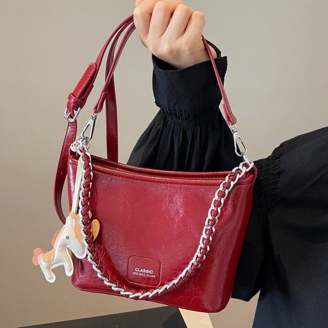 Korean style fashion pleated bucket bag 2024 new women's bag simple and versatile shoulder bag high-end niche crossbody bag