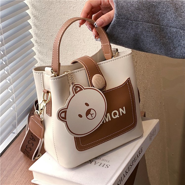 Fashion handbag for women 2024 new spring hot style stitching contrasting color single shoulder crossbody bag daily commuting bucket bag