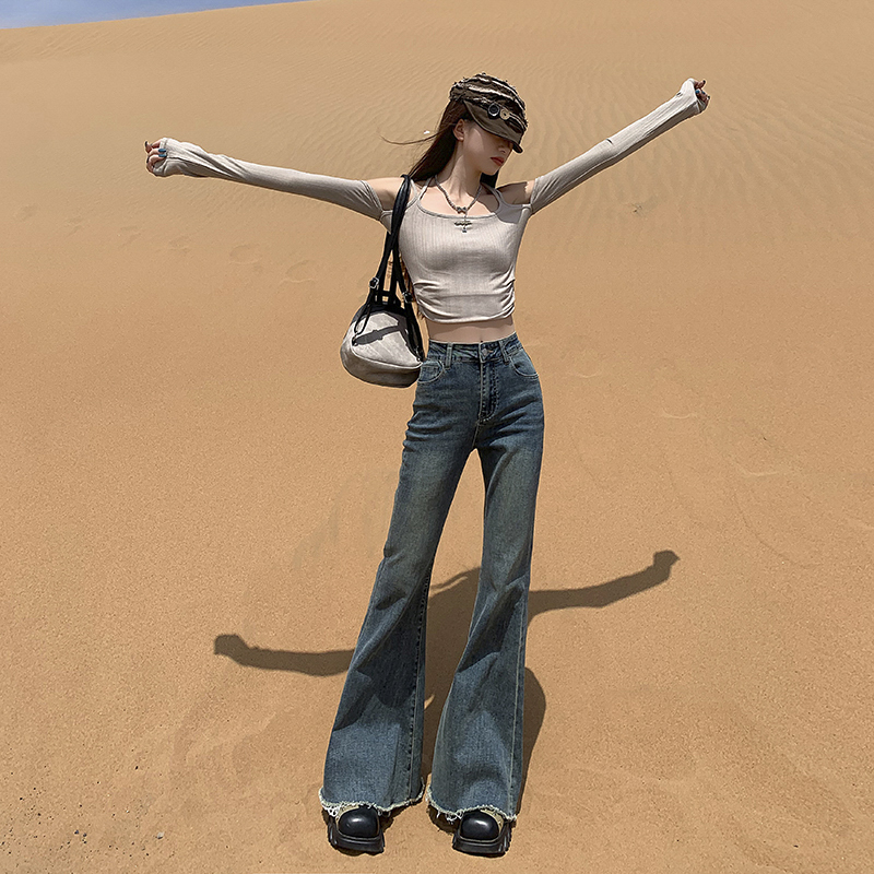 Hot European and American girls cover their hips, sexy bell-bottom jeans, versatile leather brand raw edge fishtail large bell jeans for women