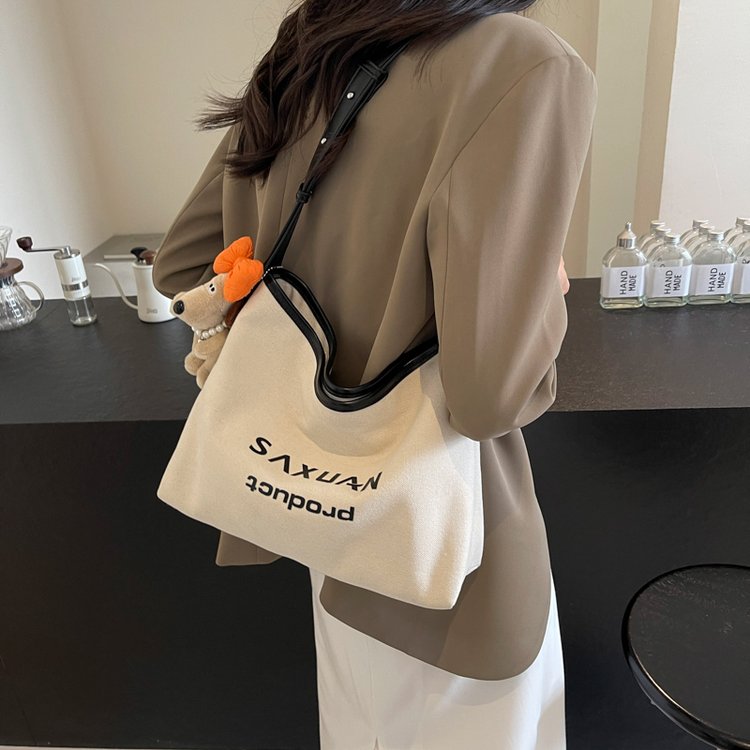 This year's popular canvas bags 2024 new bags women's bags niche design single shoulder armpit bag hand tote bag