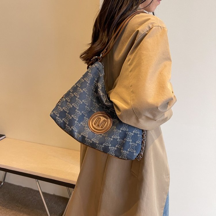 Commuting large-capacity tote bag new canvas multi-purpose chain backpack single shoulder portable armpit bag trendy